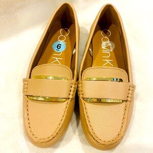 Beige women’s loafers
